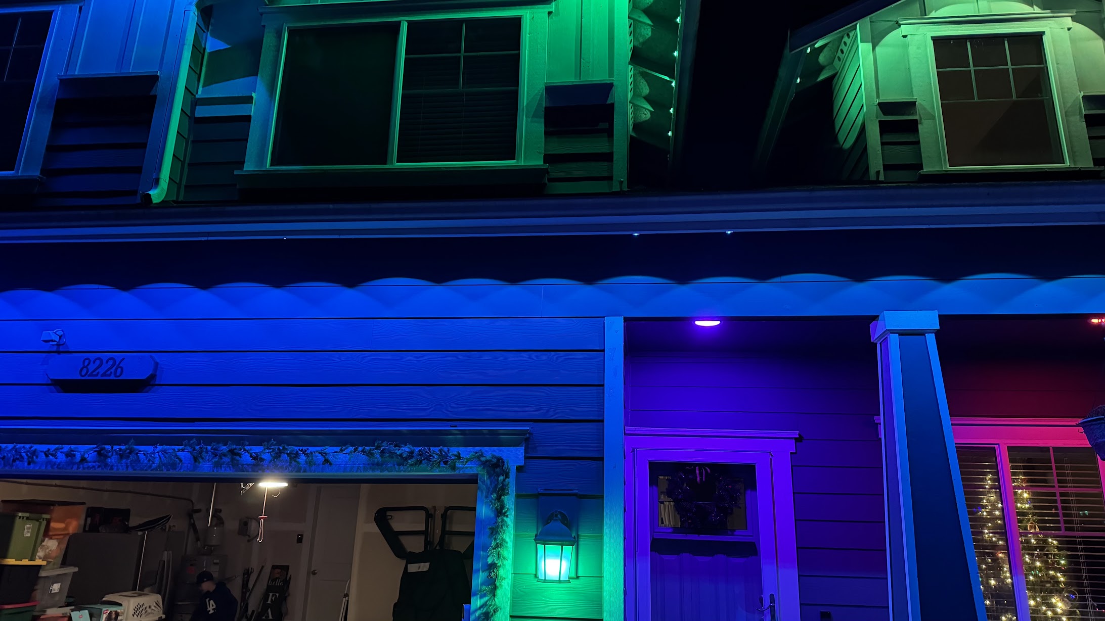 Permanent Holiday Lighting installation on house at night